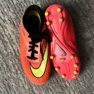 Nike Bright Orange Soccer Cleats with Black and Yellow